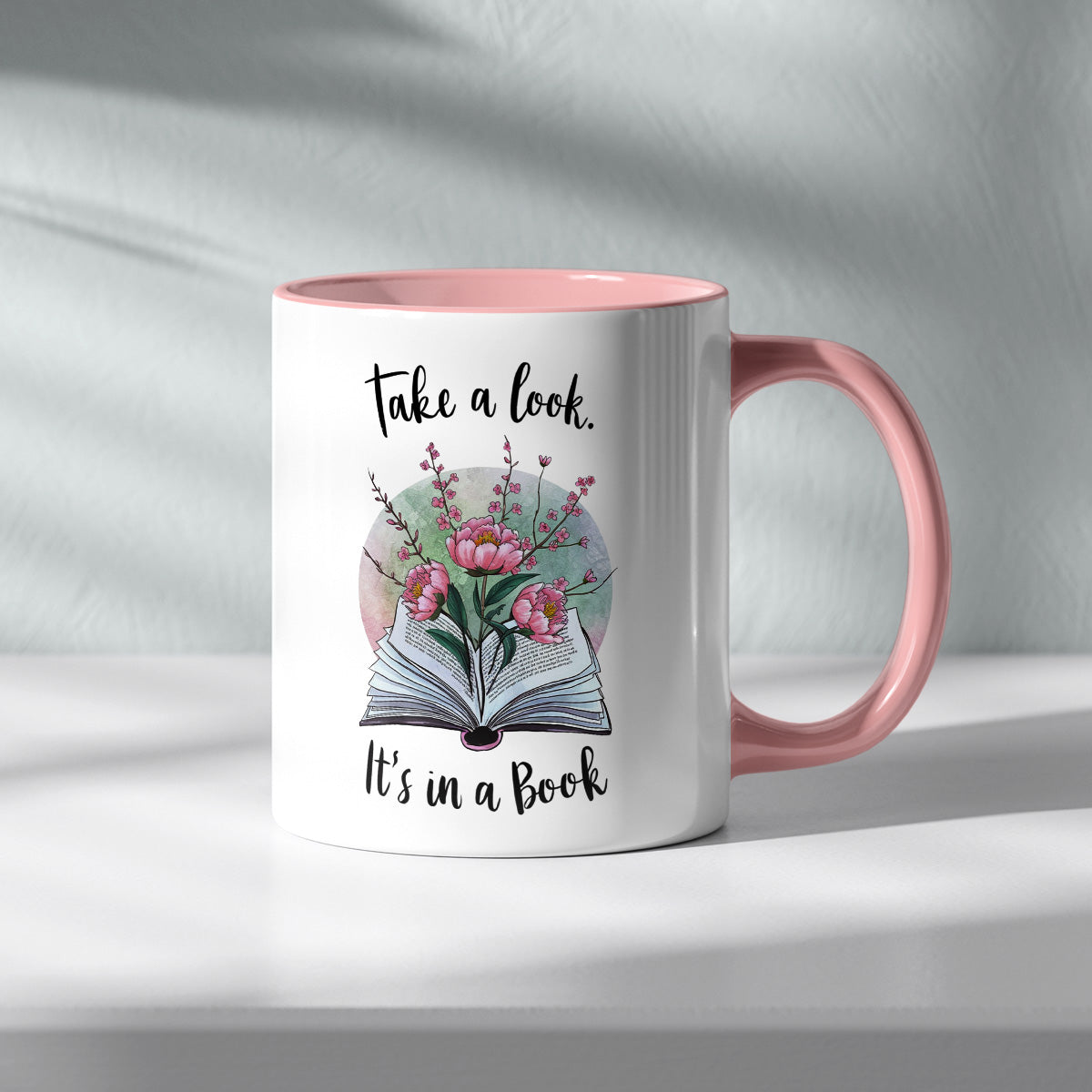 TAKE A LOOK ITS IN A BOOK - TASSE